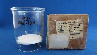 Filtro de Gooch y su empaque original. Marca Kimax